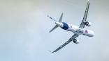 An Airbus A321XLR flying in the sky.